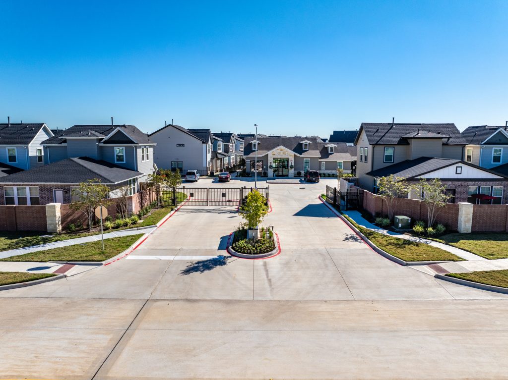 Gated entrance to a build-to-rent community